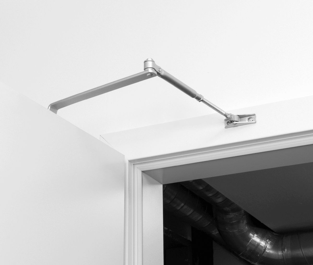 Dørlukker DC01 inkl. arm for lette innvendig tredører